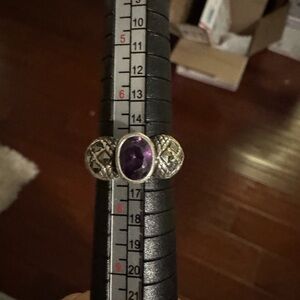 Intricate Sterling Silver and amethyst Ring with green stones on the side. 7